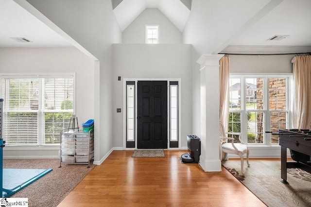 9 Peninsula Ct, Simpsonville, SC 29681 - entrance foyer featuring wood finished floors, baseboards, and a towering ceiling