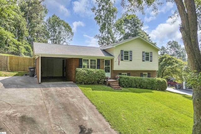 12 Ridgeline Dr, Liberty, SC 29657 - split level home featuring concrete driveway, brick siding, and a carport