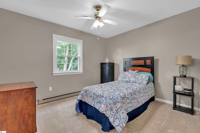 12 Ridgeline Dr, Liberty, SC 29657 - carpeted bedroom with a baseboard heating unit, baseboards, and a ceiling fan