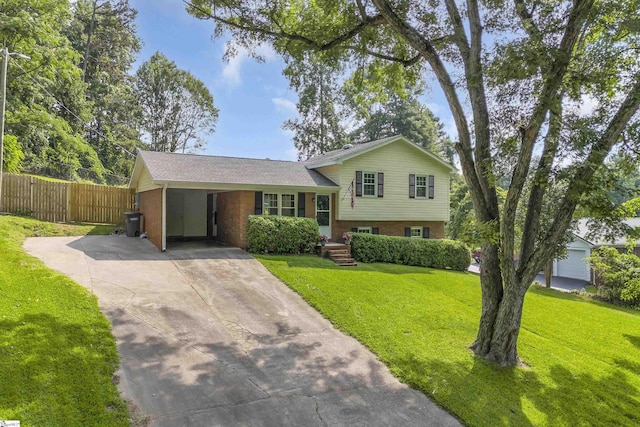 12 Ridgeline Dr, Liberty, SC 29657 - tri-level home with concrete driveway, brick siding, and an attached carport
