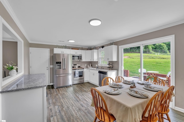 12 Ridgeline Dr, Liberty, SC 29657 - dining area featuring crown molding, wood finished floors, and baseboards