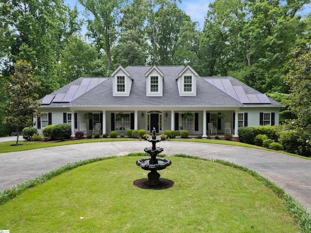 119 Oak Crest Cir, Seneca, SC 29672 - view of front of home with a porch, curved driveway, a front yard, and solar panels