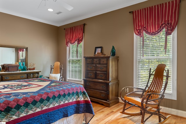 119 Oak Crest Cir, Seneca, SC 29672 - bedroom featuring light wood-type flooring, multiple windows, baseboards, and ornamental molding