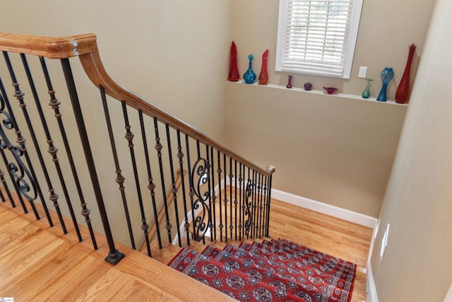 119 Oak Crest Cir, Seneca, SC 29672 - stairs featuring wood finished floors and baseboards