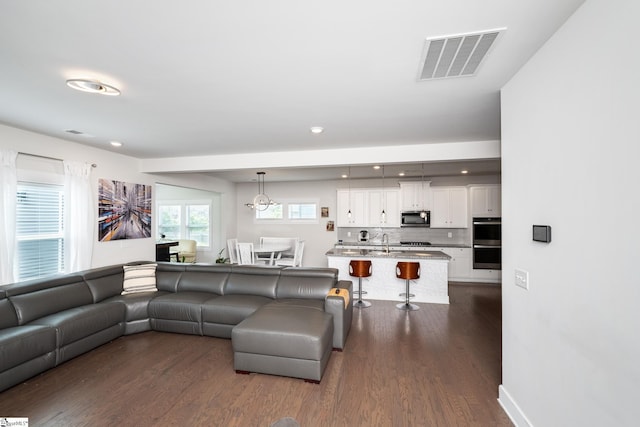 116 Quiet Creek Ct, Simpsonville, SC 29681 - living room with dark wood finished floors and recessed lighting
