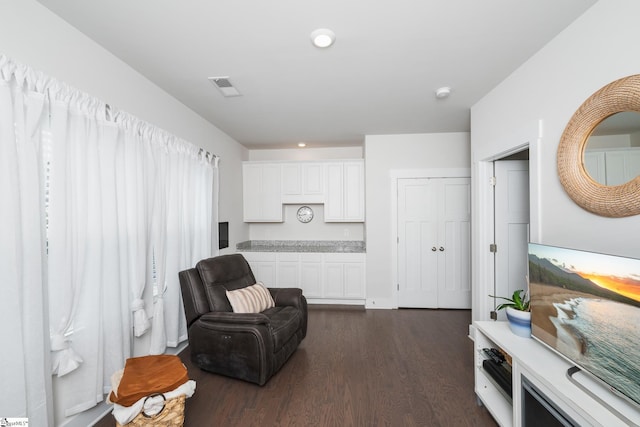 116 Quiet Creek Ct, Simpsonville, SC 29681 - sitting room with dark wood finished floors and recessed lighting