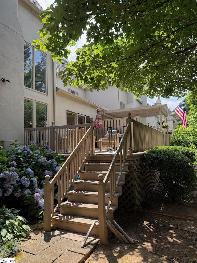 100 Castellan Dr, Greer, SC 29650 - back of house featuring stairway, stucco siding, and a deck