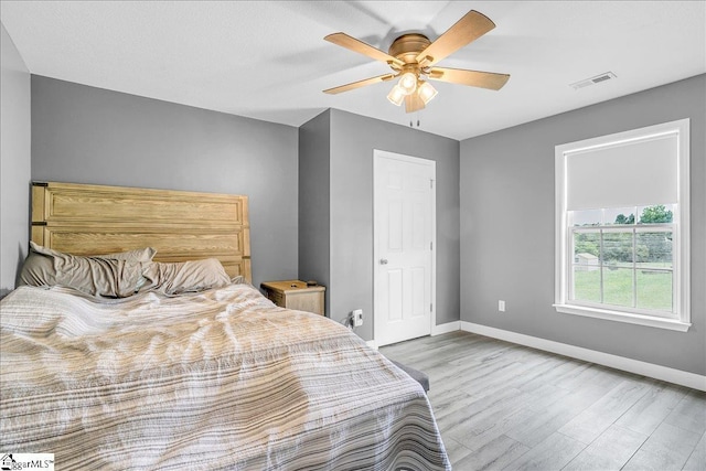 251 Heatherbrook Dr, Lyman, SC 29365 - bedroom featuring wood finished floors, baseboards, and ceiling fan