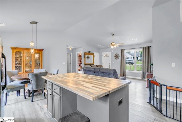 251 Heatherbrook Dr, Lyman, SC 29365 - kitchen featuring lofted ceiling, light wood finished floors, decorative light fixtures, butcher block countertops, and ceiling fan