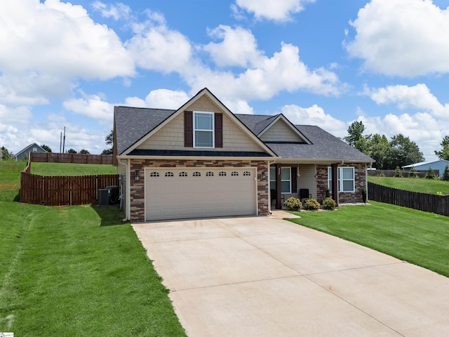 825 Brennan Way, Lyman, SC 29365 - craftsman house featuring concrete driveway, a garage, stone siding, a shingled roof, and central air condition unit