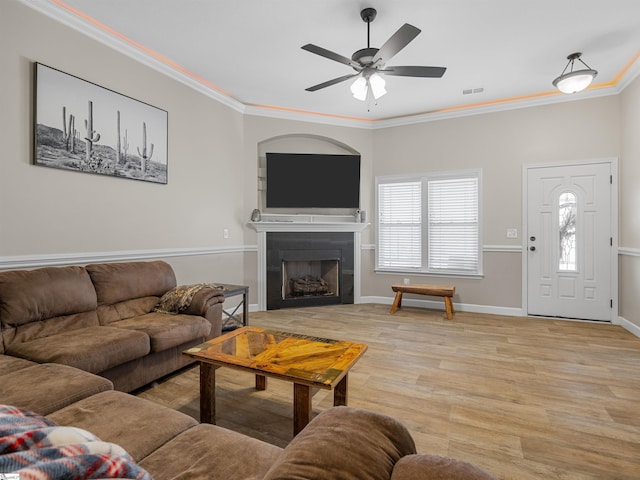 825 Brennan Way, Lyman, SC 29365 - living room with ornamental molding, a fireplace, baseboards, ceiling fan, and light wood finished floors