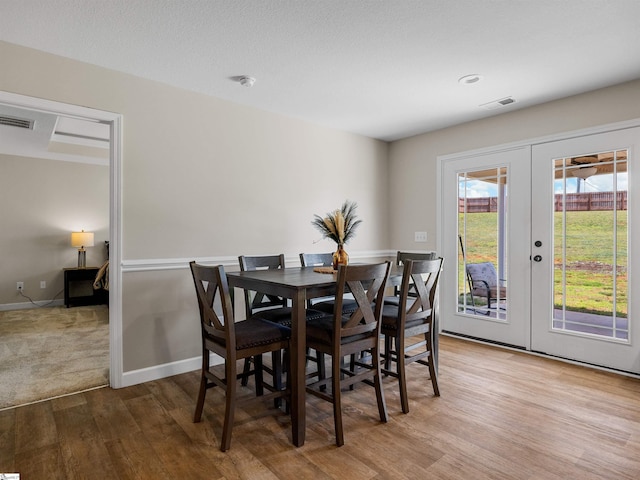 825 Brennan Way, Lyman, SC 29365 - dining area with wood finished floors, french doors, and baseboards