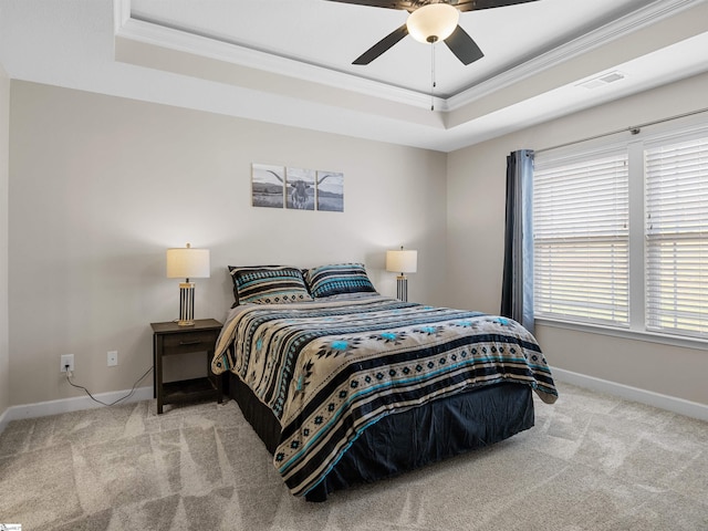 825 Brennan Way, Lyman, SC 29365 - bedroom featuring crown molding, a raised ceiling, carpet flooring, baseboards, and a ceiling fan