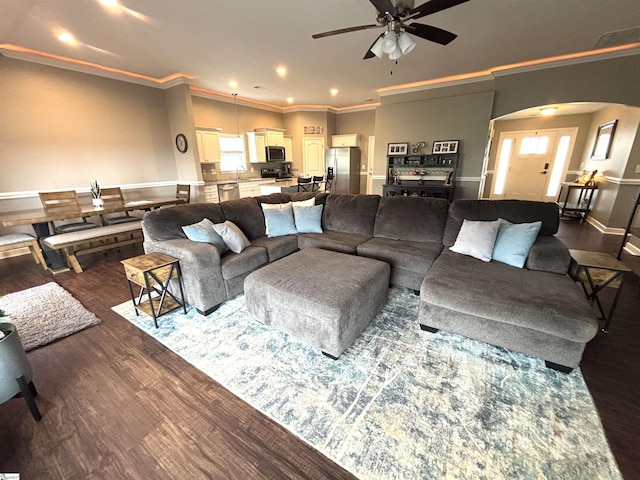 844 Brennan Way, Lyman, SC 29365 - living room with ornamental molding, a ceiling fan, dark wood-type flooring, arched walkways, and recessed lighting