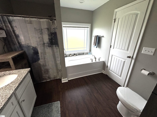 844 Brennan Way, Lyman, SC 29365 - bathroom featuring toilet, a bath, vanity, wood finished floors, and curtained shower