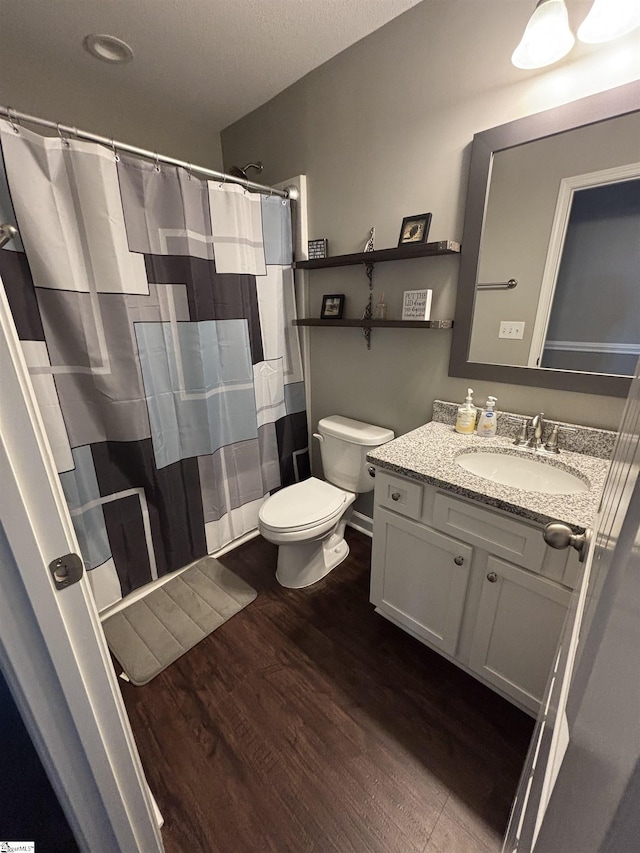 844 Brennan Way, Lyman, SC 29365 - full bath with wood finished floors, toilet, vanity, and a shower with curtain