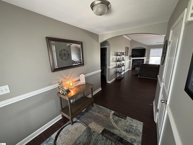 844 Brennan Way, Lyman, SC 29365 - hall with wood finished floors, arched walkways, and baseboards