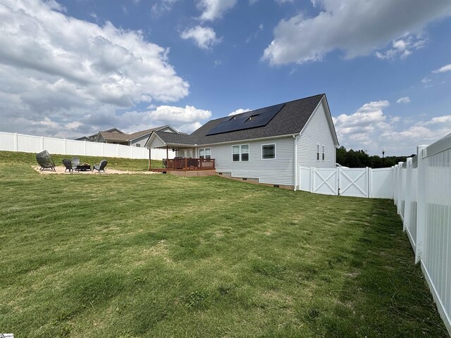 844 Brennan Way, Lyman, SC 29365 - view of yard with a fire pit, a wooden deck, and a gate