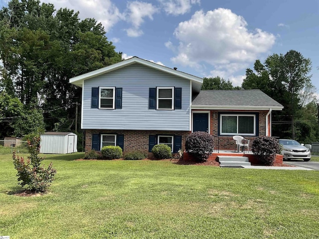 407 Old Farm Rd, Moore, SC 29539 - split level home featuring brick siding, a front yard, and roof with shingles