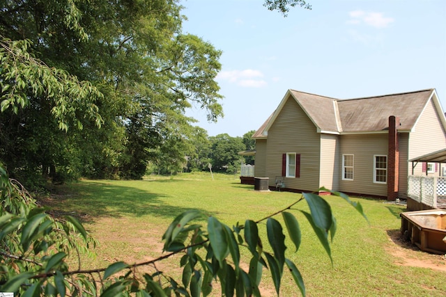 295 Dorn St, Westminster, SC 29693 - view of green lawn featuring central AC
