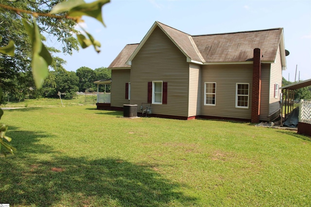 295 Dorn St, Westminster, SC 29693 - back of house with a lawn, central AC, and roof with shingles