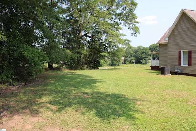 295 Dorn St, Westminster, SC 29693 - view of green lawn featuring central AC