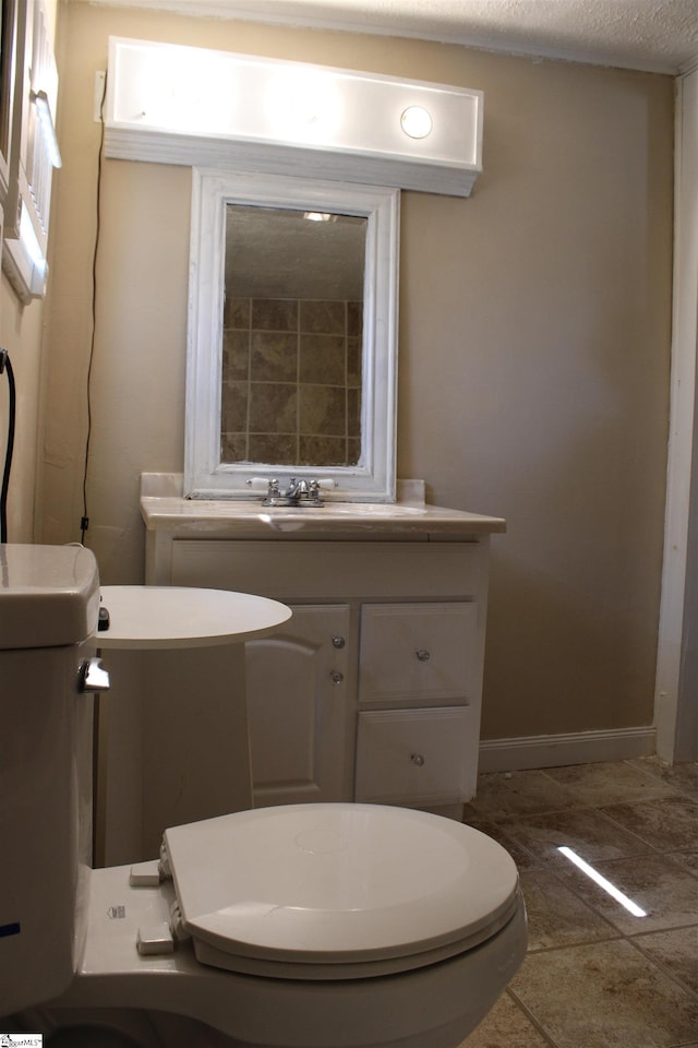 295 Dorn St, Westminster, SC 29693 - bathroom featuring vanity, toilet, and baseboards