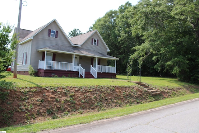 295 Dorn St, Westminster, SC 29693 - country-style home featuring crawl space, covered porch, a front yard, and a shingled roof