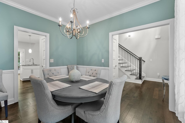8 Spur Dr, Travelers Rest, SC 29690 - dining room with stairway, dark wood finished floors, wainscoting, a chandelier, and crown molding