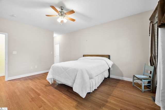 1847 Bertha Knight Rd, Lancaster, SC 29720 - bedroom featuring wood finished floors, baseboards, and ceiling fan