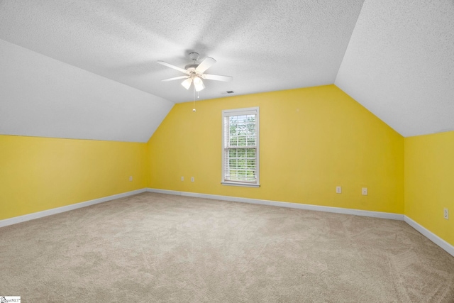 1847 Bertha Knight Rd, Lancaster, SC 29720 - additional living space featuring a ceiling fan, carpet floors, lofted ceiling, a textured ceiling, and baseboards