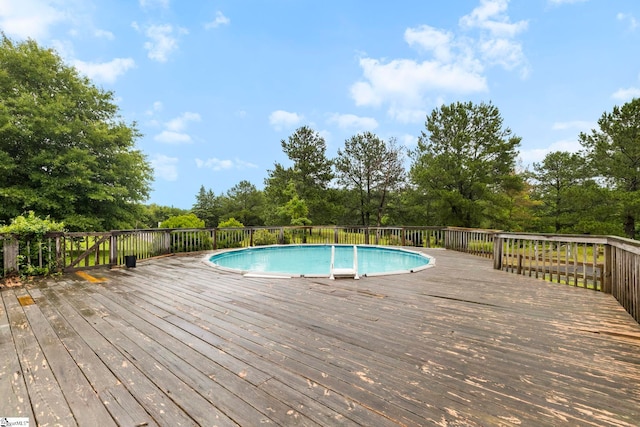1847 Bertha Knight Rd, Lancaster, SC 29720 - view of swimming pool with a deck and view of wooded area