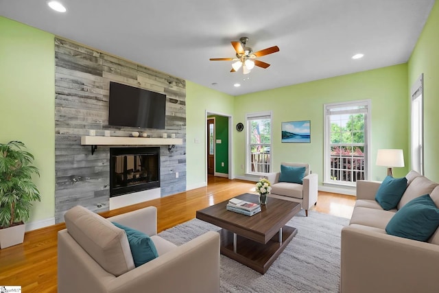 1847 Bertha Knight Rd, Lancaster, SC 29720 - living area featuring ceiling fan, wood finished floors, a fireplace, recessed lighting, and baseboards