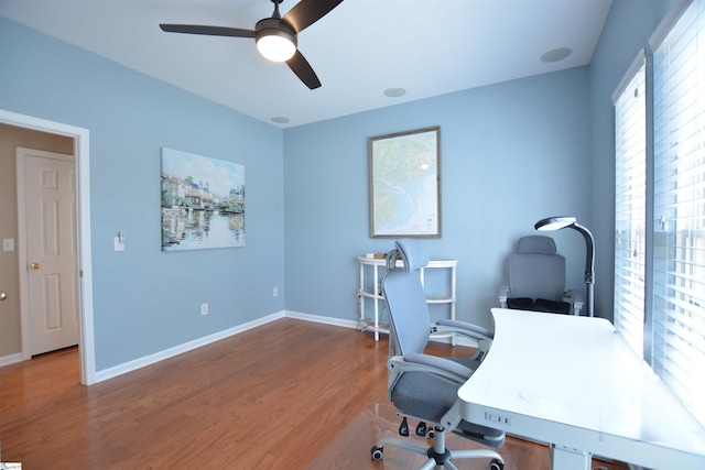 10 Bamburgh Brae Ct, Simpsonville, SC 29681 - home office with a ceiling fan, wood finished floors, and baseboards