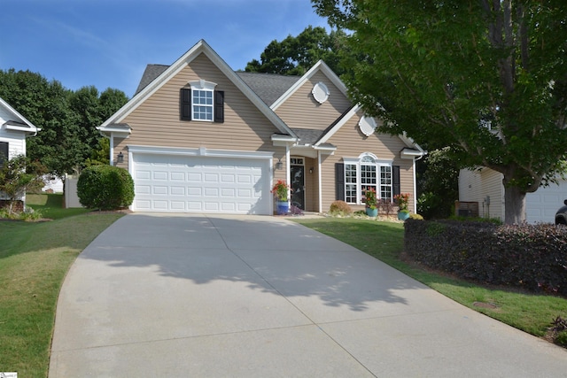 10 Bamburgh Brae Ct, Simpsonville, SC 29681 - traditional-style home with driveway, a front lawn, and a garage