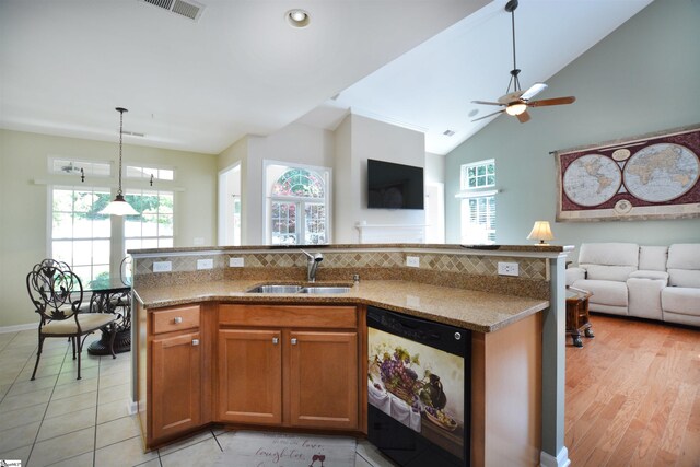 10 Bamburgh Brae Ct, Simpsonville, SC 29681 - kitchen with dishwashing machine, open floor plan, a sink, healthy amount of natural light, and high vaulted ceiling