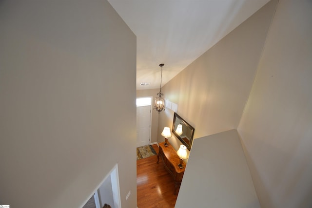 10 Bamburgh Brae Ct, Simpsonville, SC 29681 - stairs with wood finished floors and a chandelier