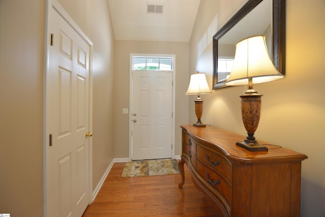 10 Bamburgh Brae Ct, Simpsonville, SC 29681 - foyer entrance with light wood-type flooring, lofted ceiling, and baseboards