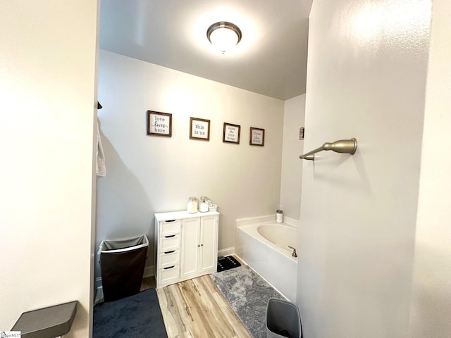 220 Scottish Ave, Simpsonville, SC 29680 - bathroom featuring a bath and wood finished floors