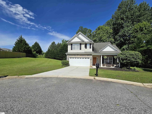 605 Spirit Mountain Ln, Easley, SC 29642 - traditional home with concrete driveway, a garage, and a porch
