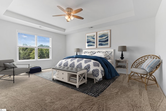 474 Grantham Ct, Spartanburg, SC 29303 - carpeted bedroom featuring a raised ceiling, baseboards, and a ceiling fan