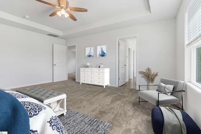 474 Grantham Ct, Spartanburg, SC 29303 - carpeted bedroom featuring a raised ceiling, ceiling fan, and baseboards