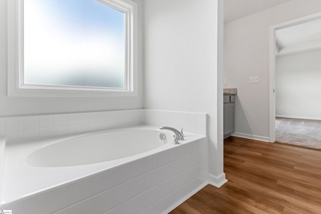 474 Grantham Ct, Spartanburg, SC 29303 - full bath with a garden tub, vanity, wood finished floors, and baseboards