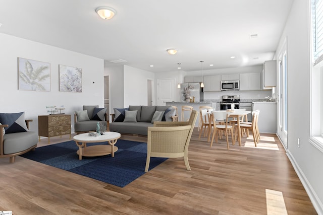 474 Grantham Ct, Spartanburg, SC 29303 - living room featuring light wood-type flooring and recessed lighting