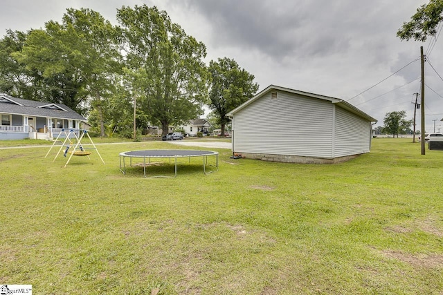 5 Alabama St, Honea Path, SC 29654 - view of grassy yard with a trampoline and a playground