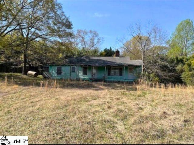 130 Poplar St, Pacolet, SC 29372 - view of front of house with a chimney