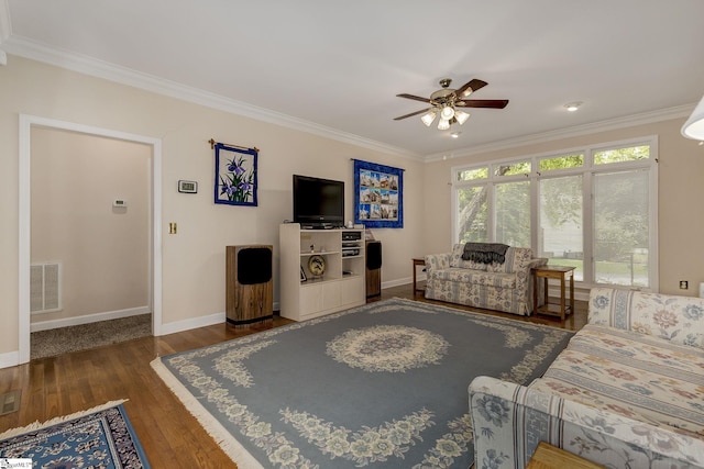 1004 Neely Farm Dr, Simpsonville, SC 29680 - living room featuring crown molding, wood finished floors, ceiling fan, and baseboards