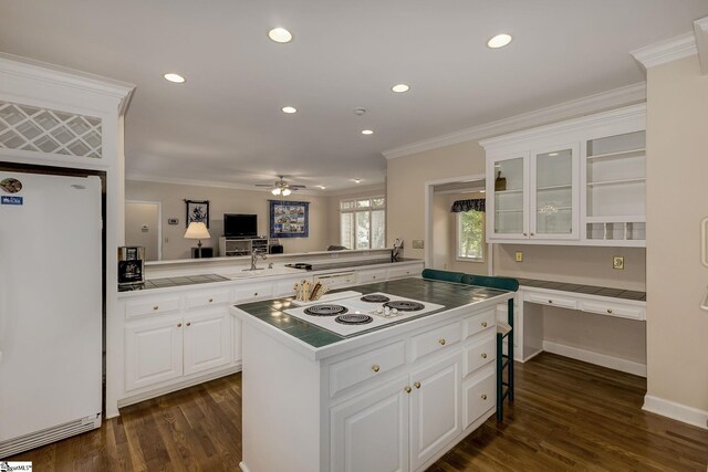 1004 Neely Farm Dr, Simpsonville, SC 29680 - kitchen featuring white appliances, a ceiling fan, crown molding, white cabinetry, and glass insert cabinets