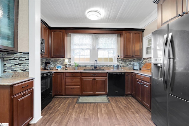 2100 Marchbanks Ave, Anderson, SC 29621 - kitchen with black appliances, a sink, ornamental molding, backsplash, and dark wood-type flooring
