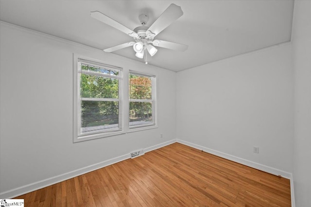 304 Robin Hood Rd, Greenville, SC 29607 - empty room with baseboards, light wood finished floors, and ceiling fan